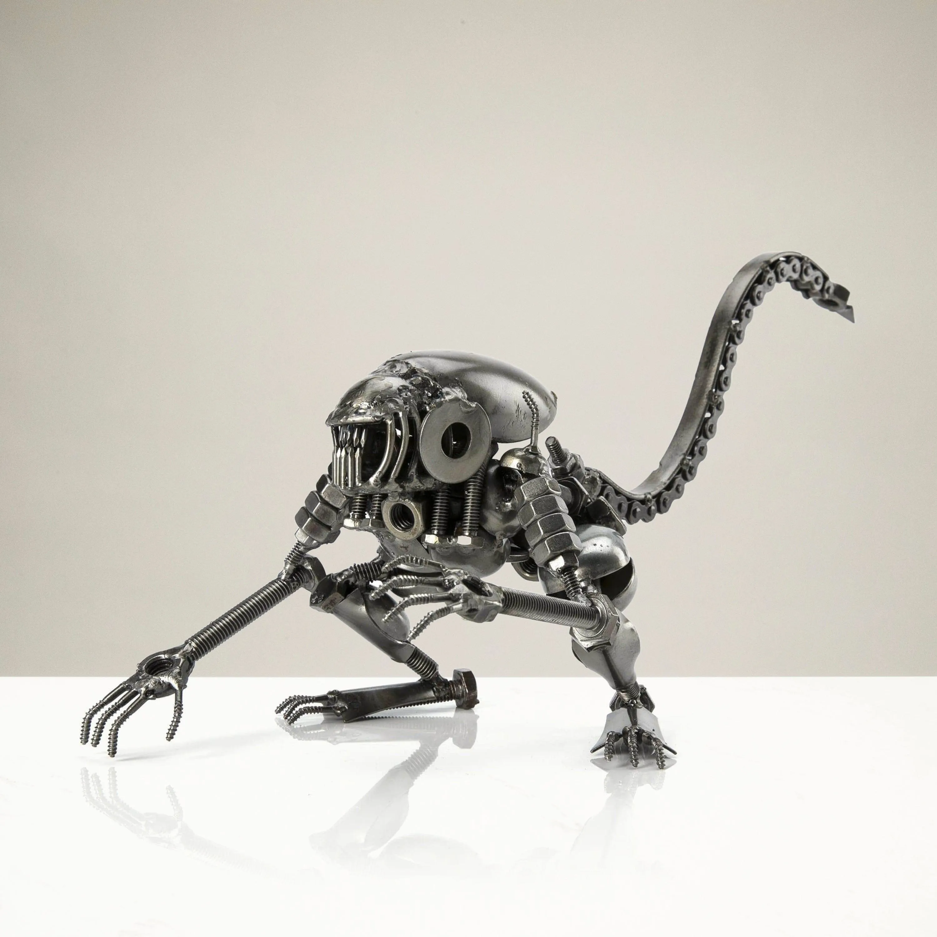 Alien Crouched Inspired Recycled Metal Sculpture