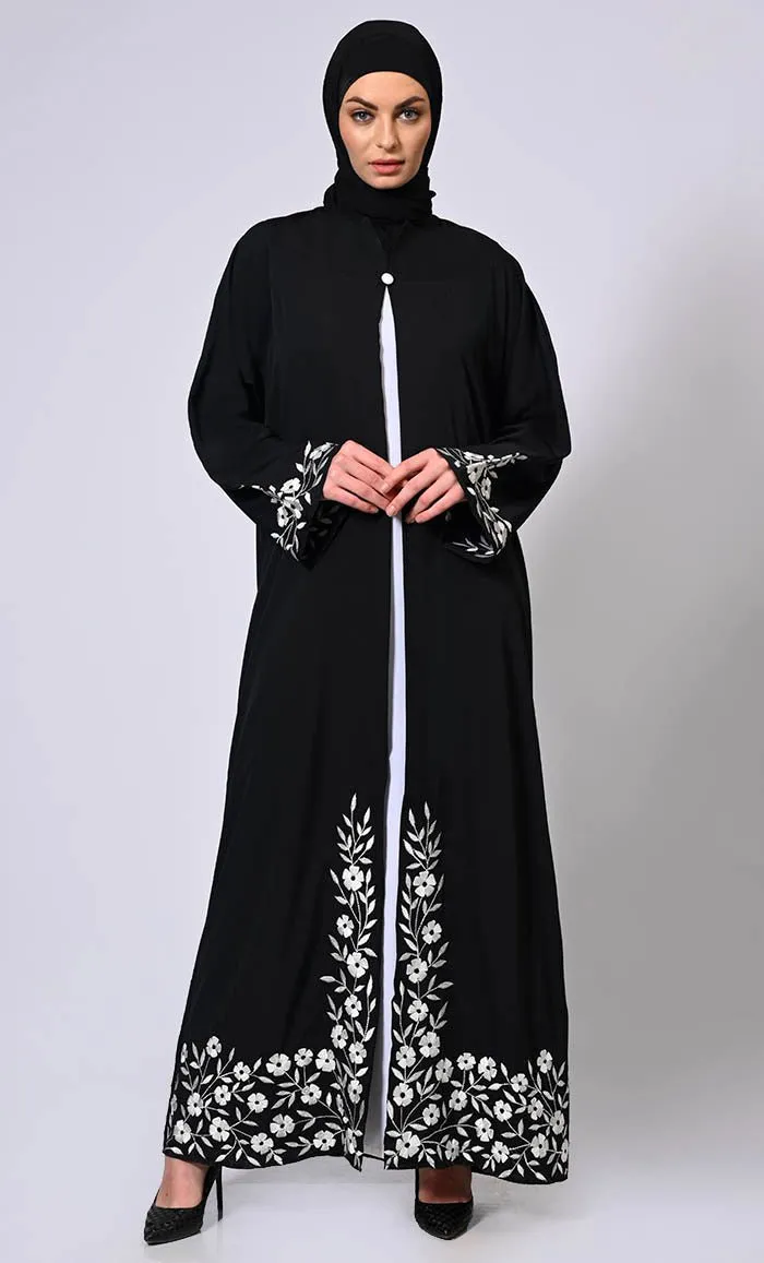 Embroidered Enchantment: Graceful Black Abaya with Delicate Details and Belt